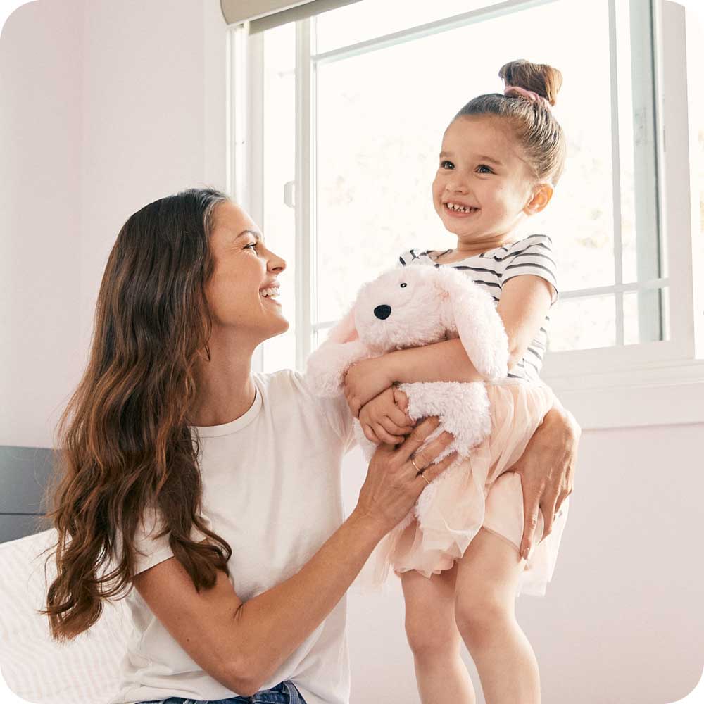 Image 103: Mother and daughter holding Cute Weighted Lavender Scented Pink Bunny Stuffed Animal Heating Pad Warmies