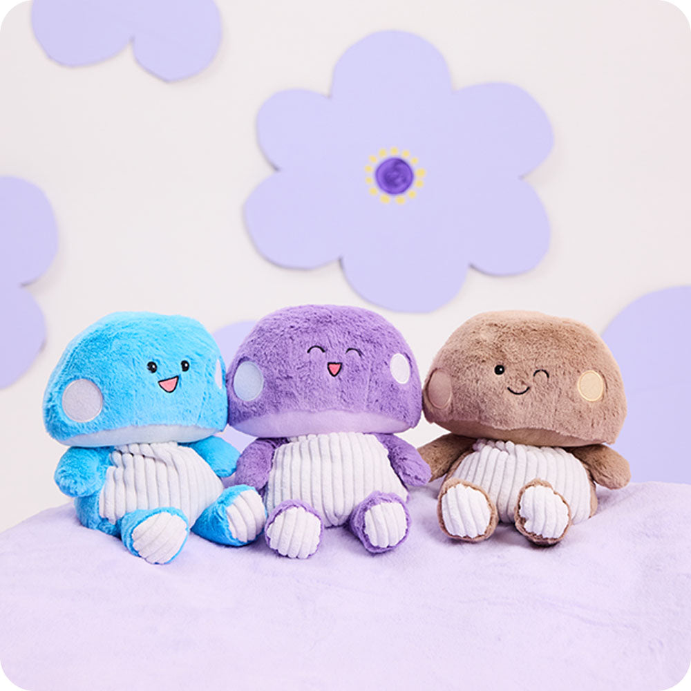 Image 109: blue, purple, and brown mushroom trio stuffed animals