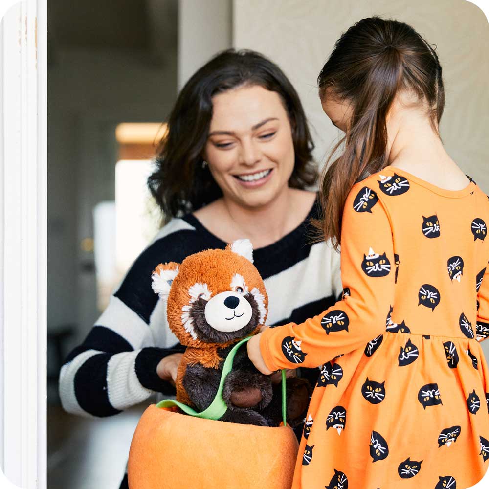 Image 102: Mother giving daughter Soft Warm Weighted Red Panda Plush Warmies