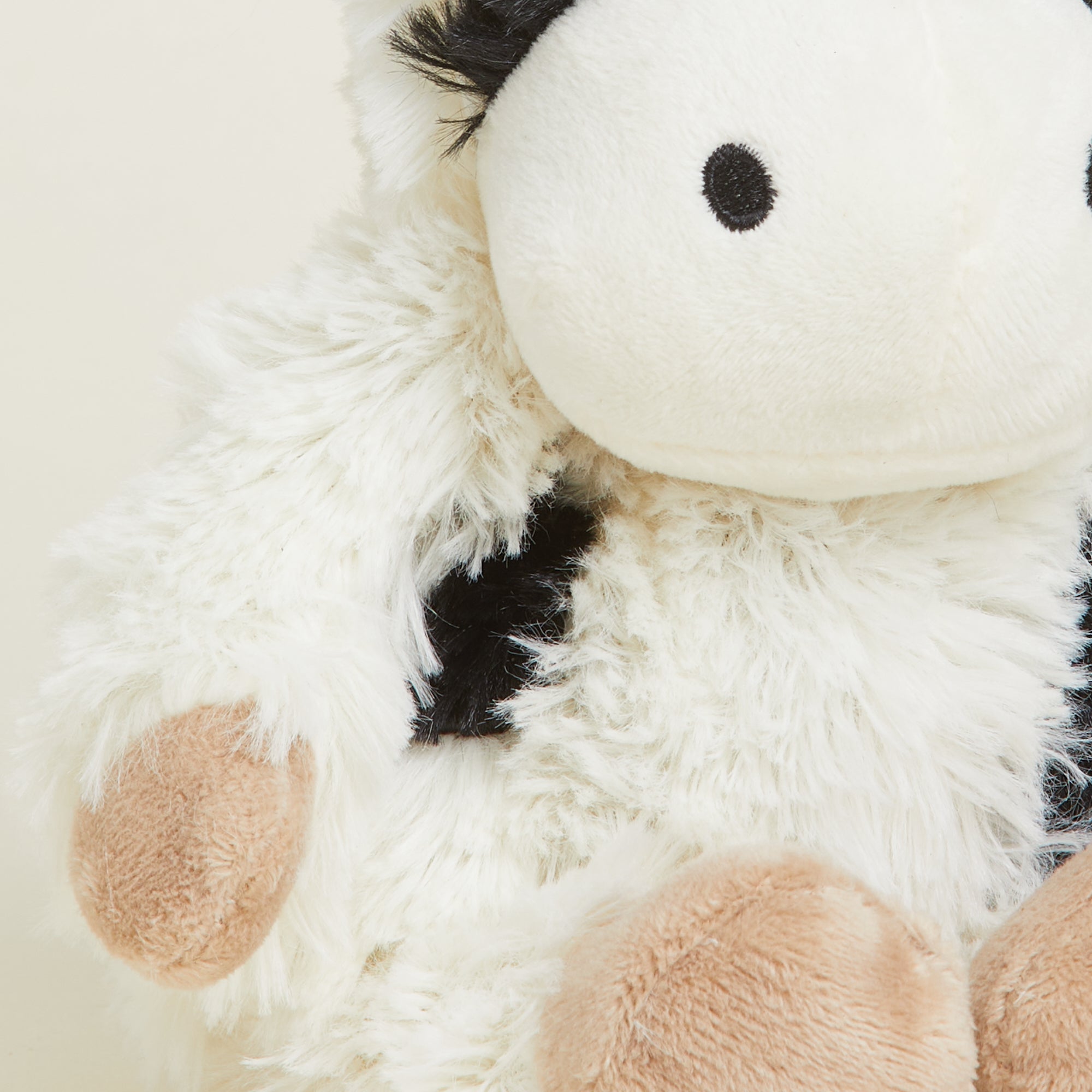 Image 101: Soft Warm Weighted Black and White Cow Plush Warmies Junior
